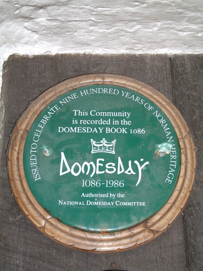 Village plaque commemorating Finchingfield's entry in the Domesday Book of 1086